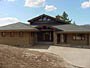 Exterior view of custom home michael Rust architect  Frank lloyd wright inspired custom home plans by former taliesin fellow