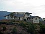 Custom home full shot michael Rust architect  Frank lloyd wright inspired custom home plans by former taliesin fellow