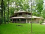 Custom home in the woods michael Rust architect  Frank lloyd wright inspired custom home plans by former taliesin fellow