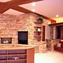 Stone used on interior walls michael Rust architect  Frank lloyd wright inspired custom home plans by former taliesin fellow