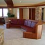 Custom home sitting area with natural stone michael Rust architect  Frank lloyd wright inspired custom home plans by former taliesin fellow